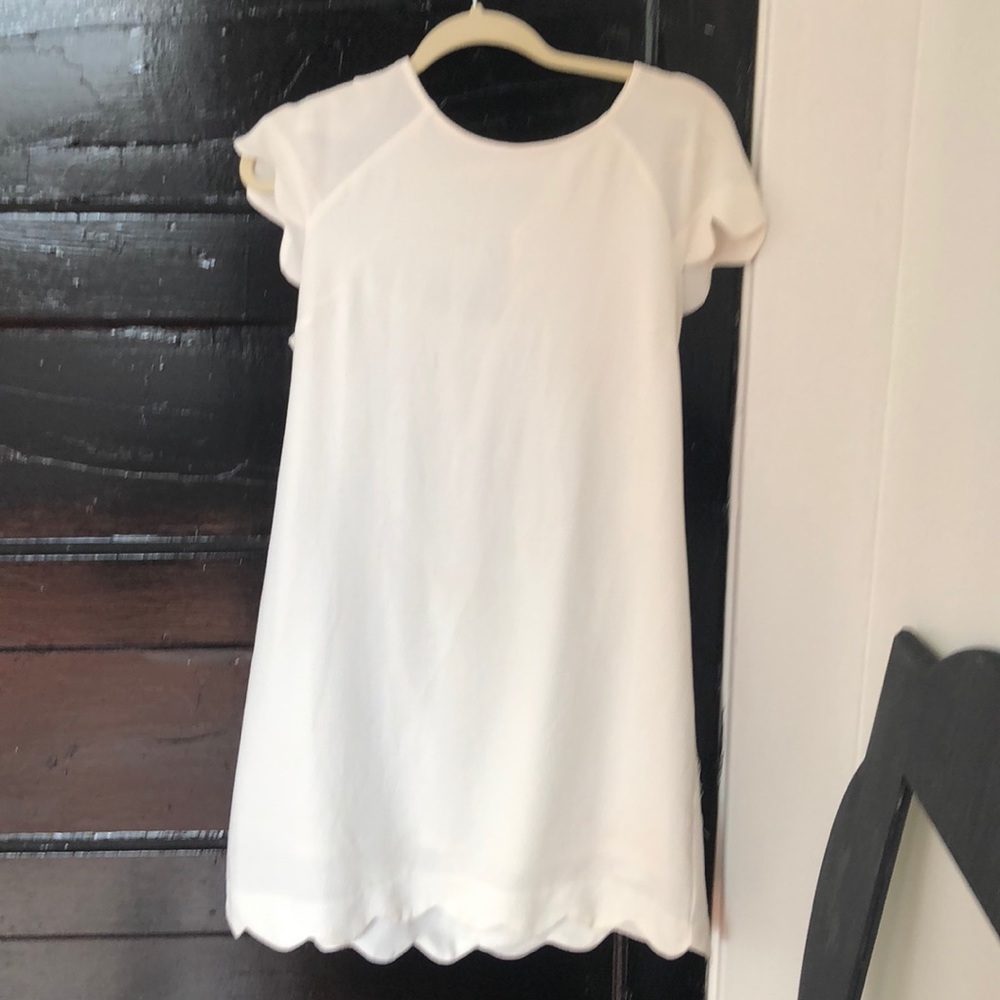 White dress, scalloped sleeves